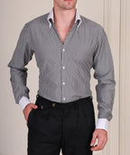 Black and white pinstripe cotton viscose shirt with white contrast collar and cuffs for men by Italian Vega®, styled with black trousers.